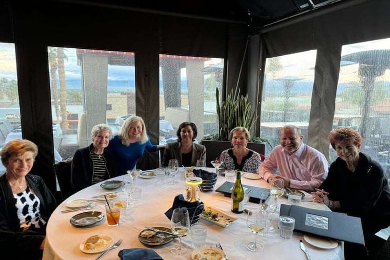 Group of advisors sitting at dining table