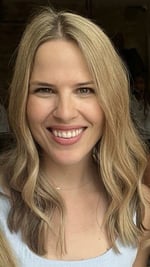 A close-up of a person smiling

Description automatically generated