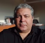 A person in a black shirt

Description automatically generated